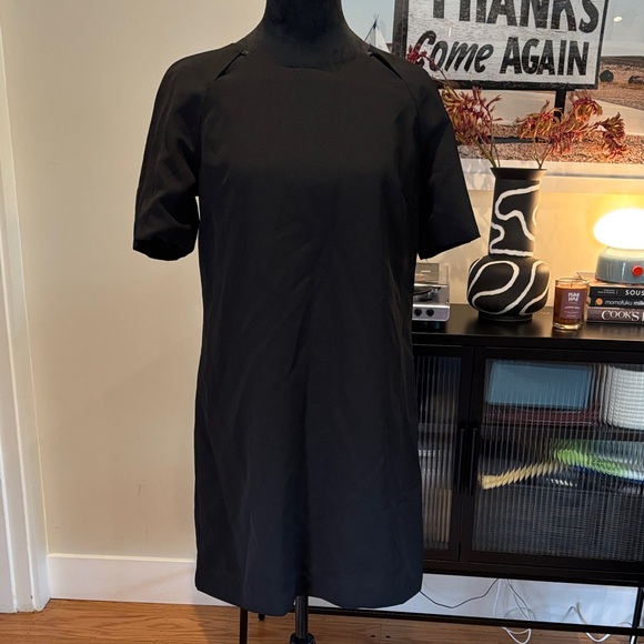 Forever 21 Dresses & Skirts - Forever 21 Elegant Black Dress with neck cut out detail